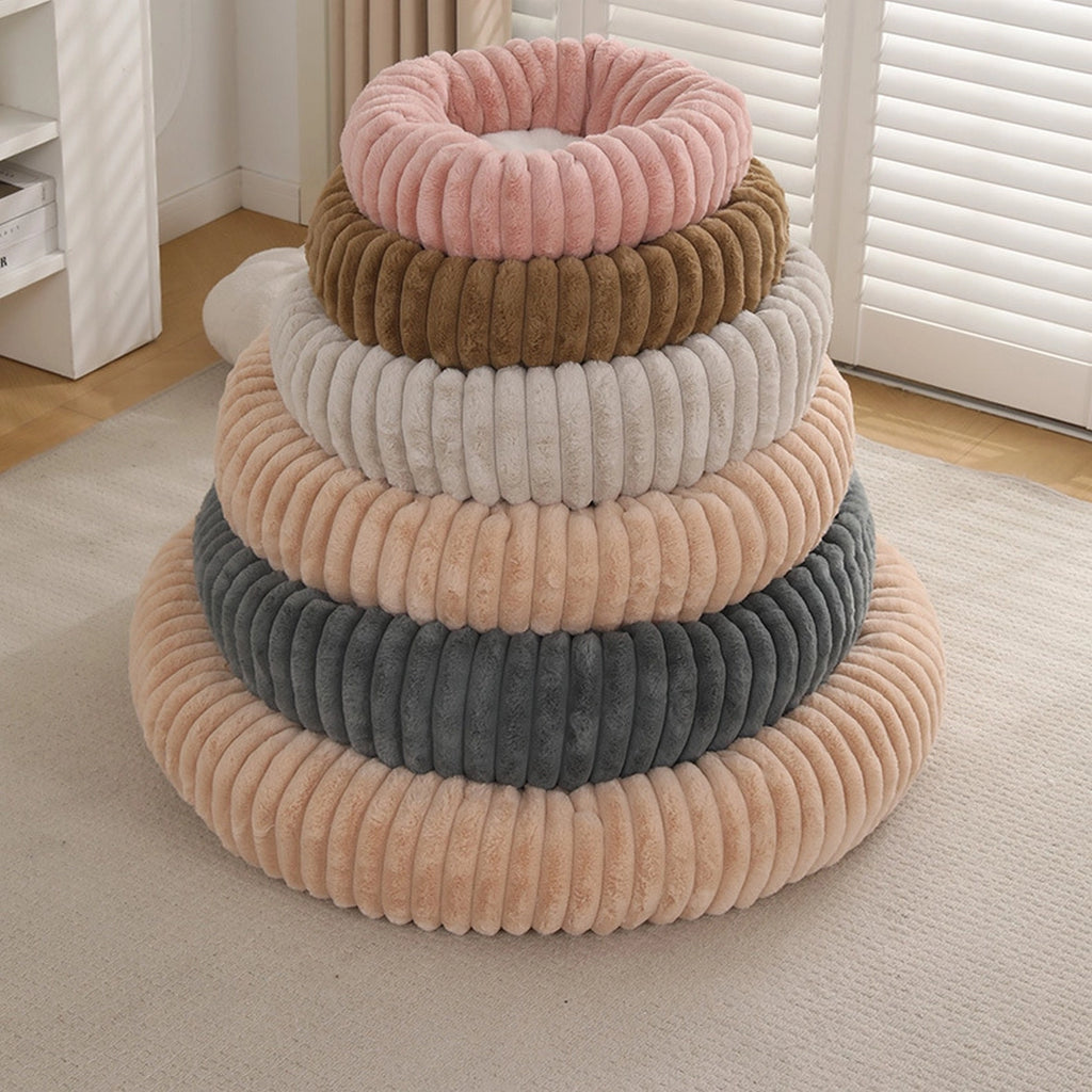 Soft faux fur calming dog bed with anti-slip bottom