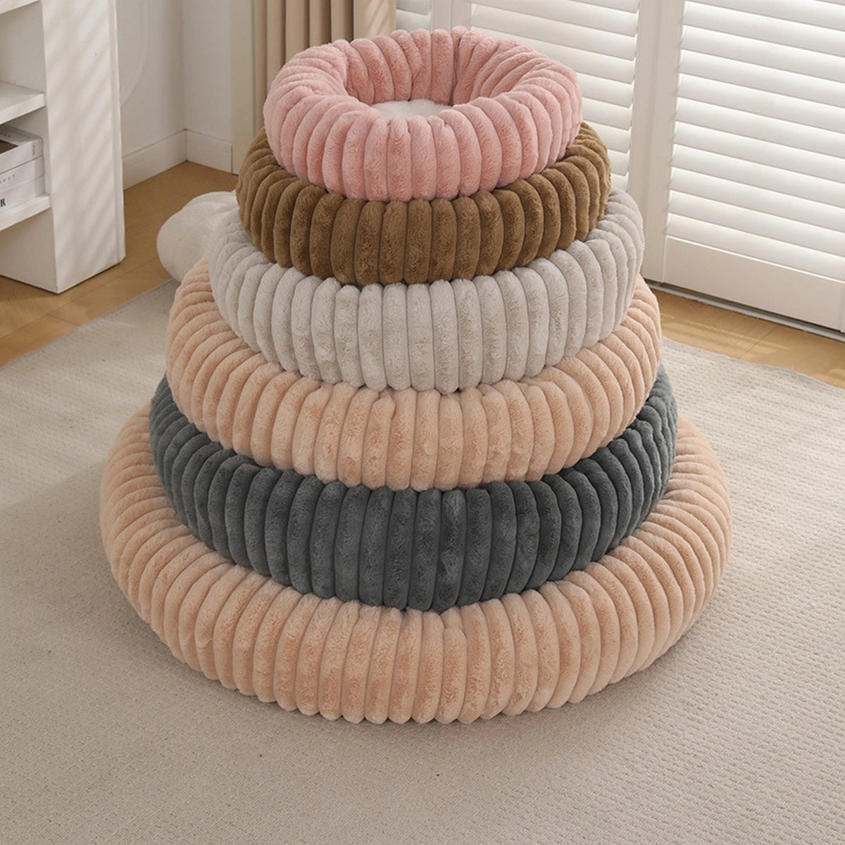 Soft faux fur calming dog bed with anti-slip bottom